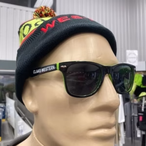 Model wearing CLAAS Western sunglasses and bobble hat
